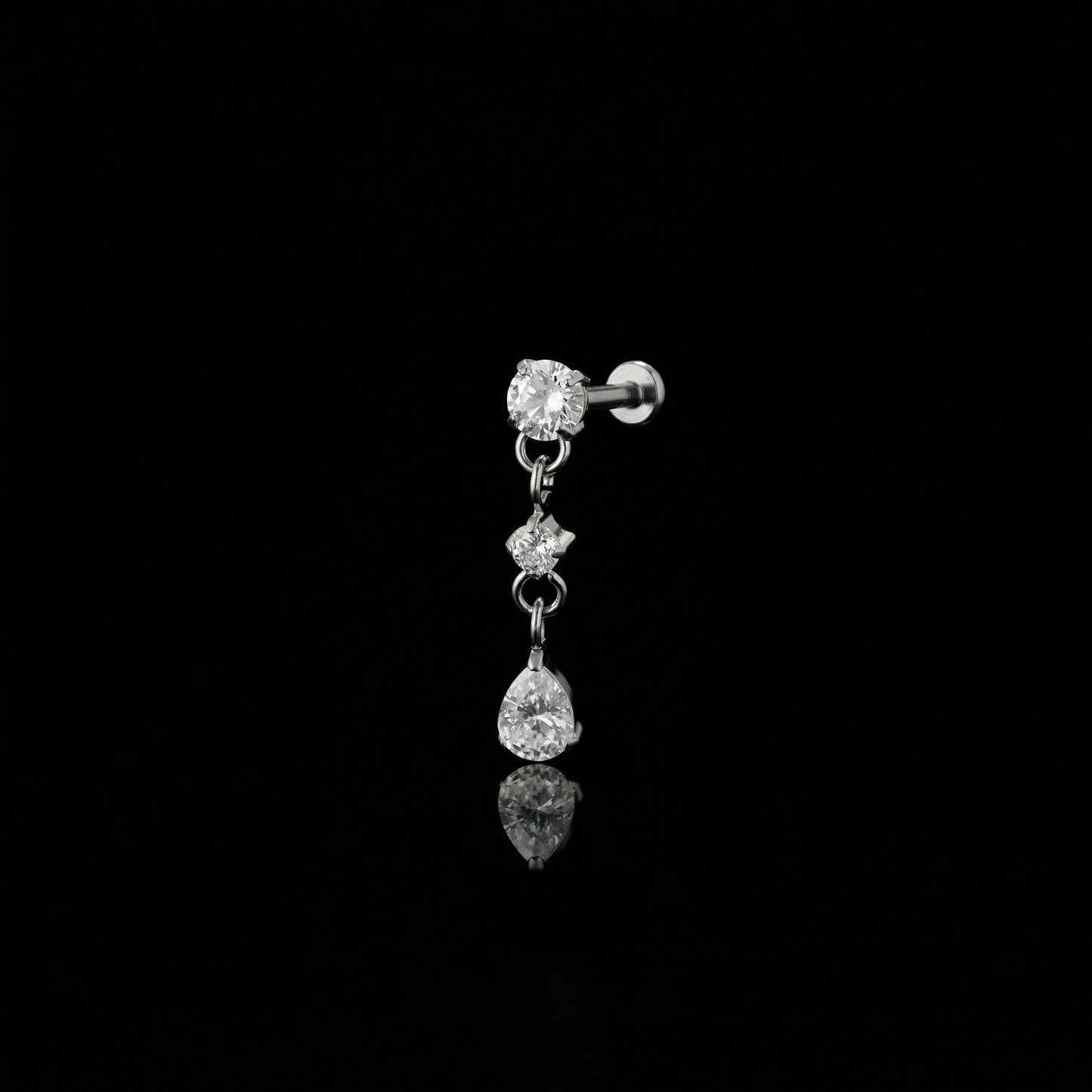 Cascade Bloom flat-back earring in titanium - ear closeup detail