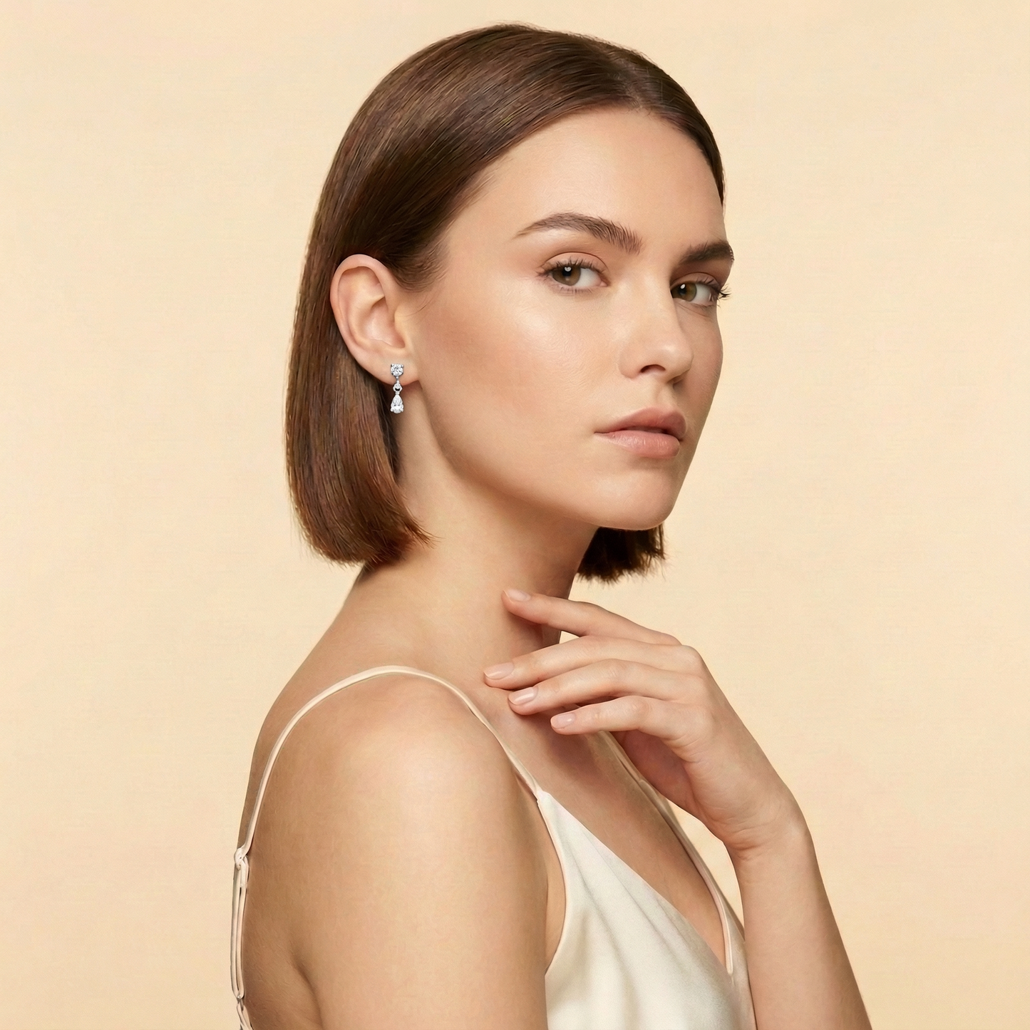 Cascade Bloom flat-back earring in titanium - worn on model ear