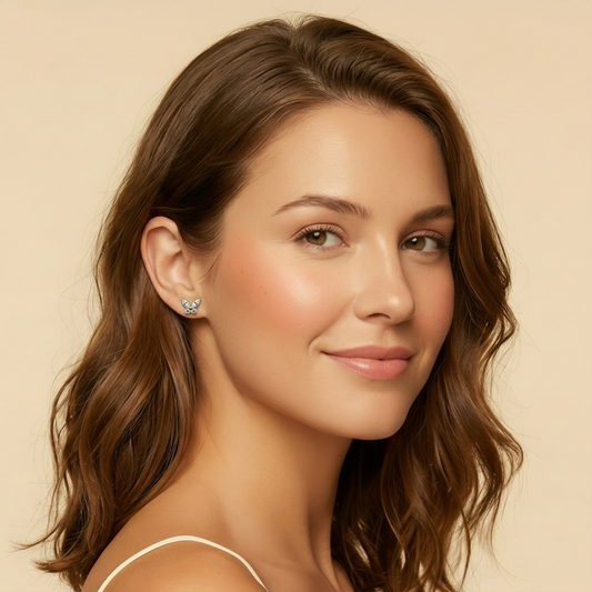 Flutter Air5 flat-back earring in gold - worn on model ear