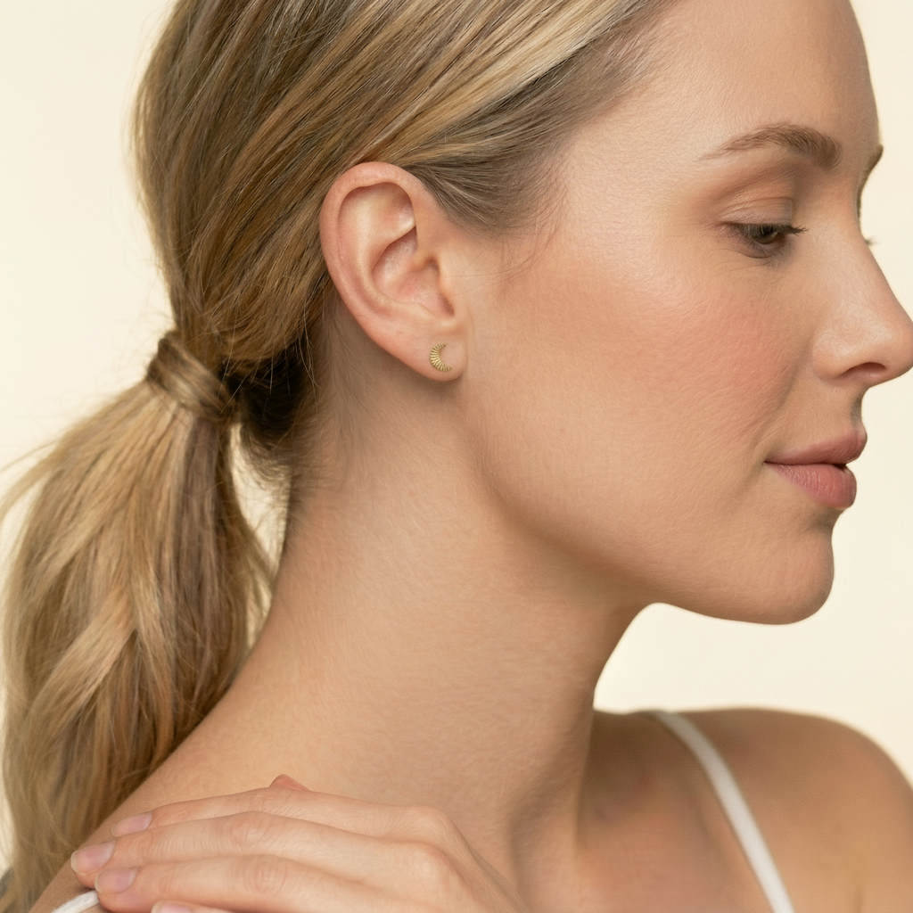 Luna Bare Air5 flat-back earring in gold - worn on model ear