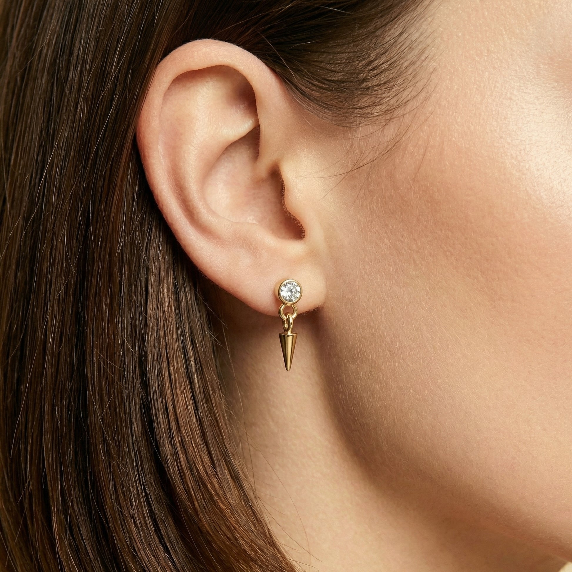 Prism Drop Bloom flat-back earring in gold - ear closeup detail