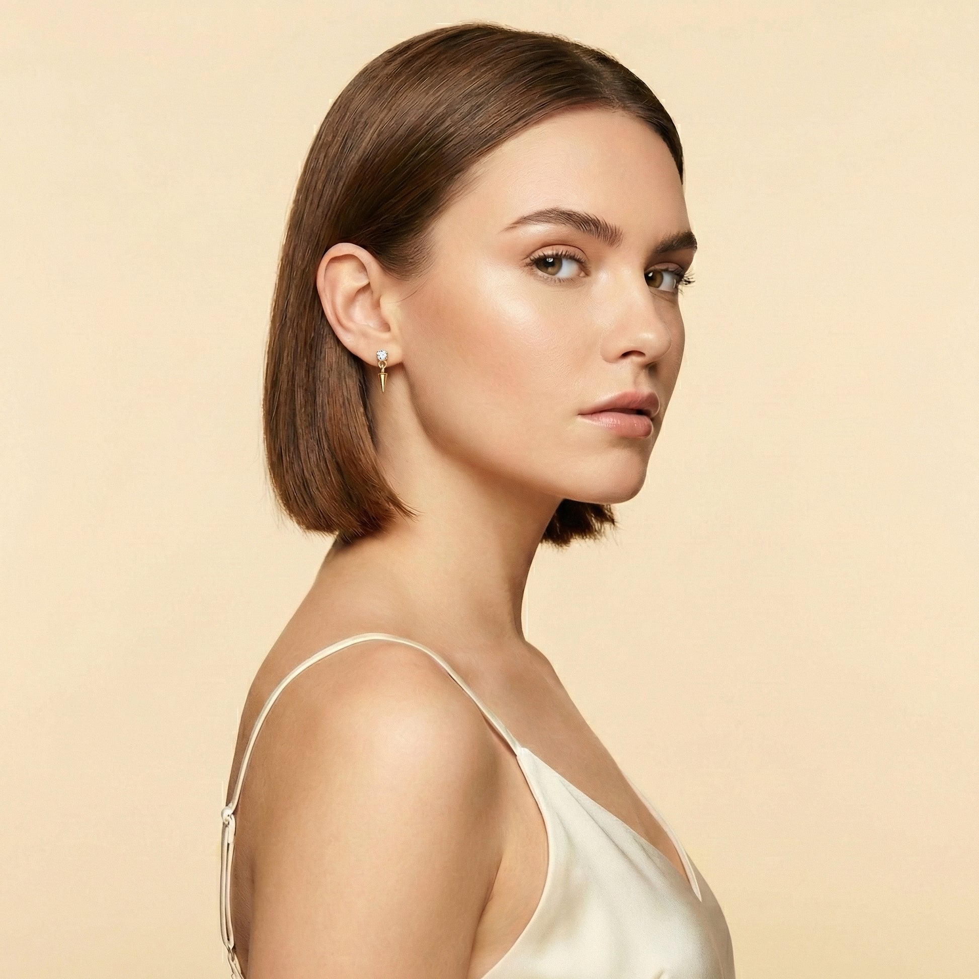 Prism Drop Bloom flat-back earring in gold - worn on model ear